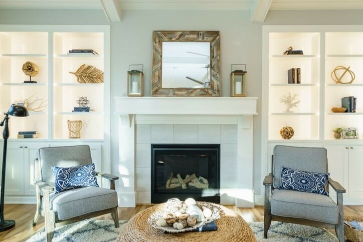 Model home living area with fireplace in Wendell Falls