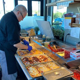 Owner &Chef Patrick Cowden making pizza