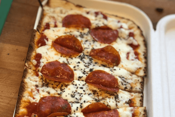 Flatbread dish at Farmers & Merchants