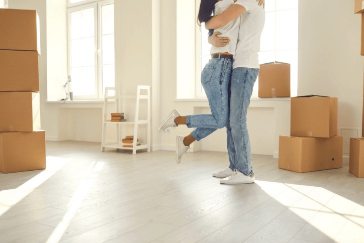 Young couple enjoying new home