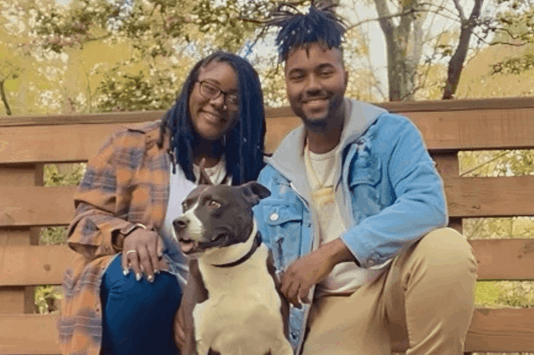 Phil, his wife Charity, and their dog