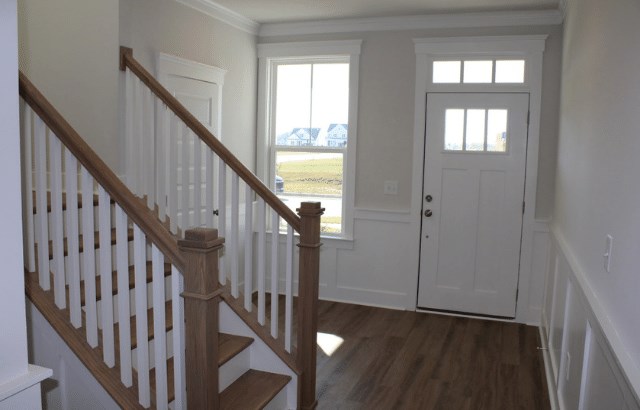 Foyer with oak tread stairs